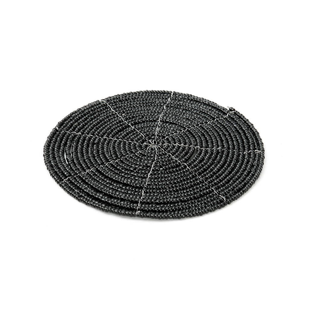 Dessous de verre rond en perles noires motif spirale