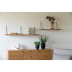 Lampe en céramique blanche avec manche en bois courbé