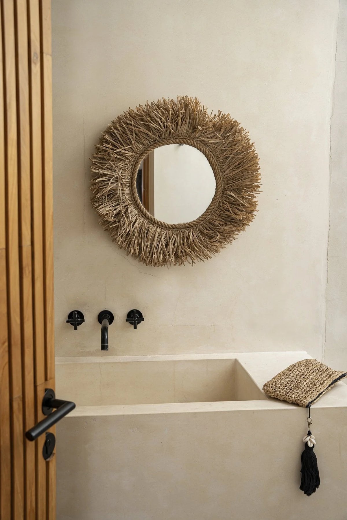 Miroir mural rond en fibres naturelles tressées avec franges en paille, diamètre 60 cm