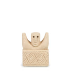 Sculpture en grès beige clair avec motif géométrique sur la base, silhouette humaine