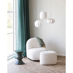 Fauteuil crème moelleux avec pouf assorti